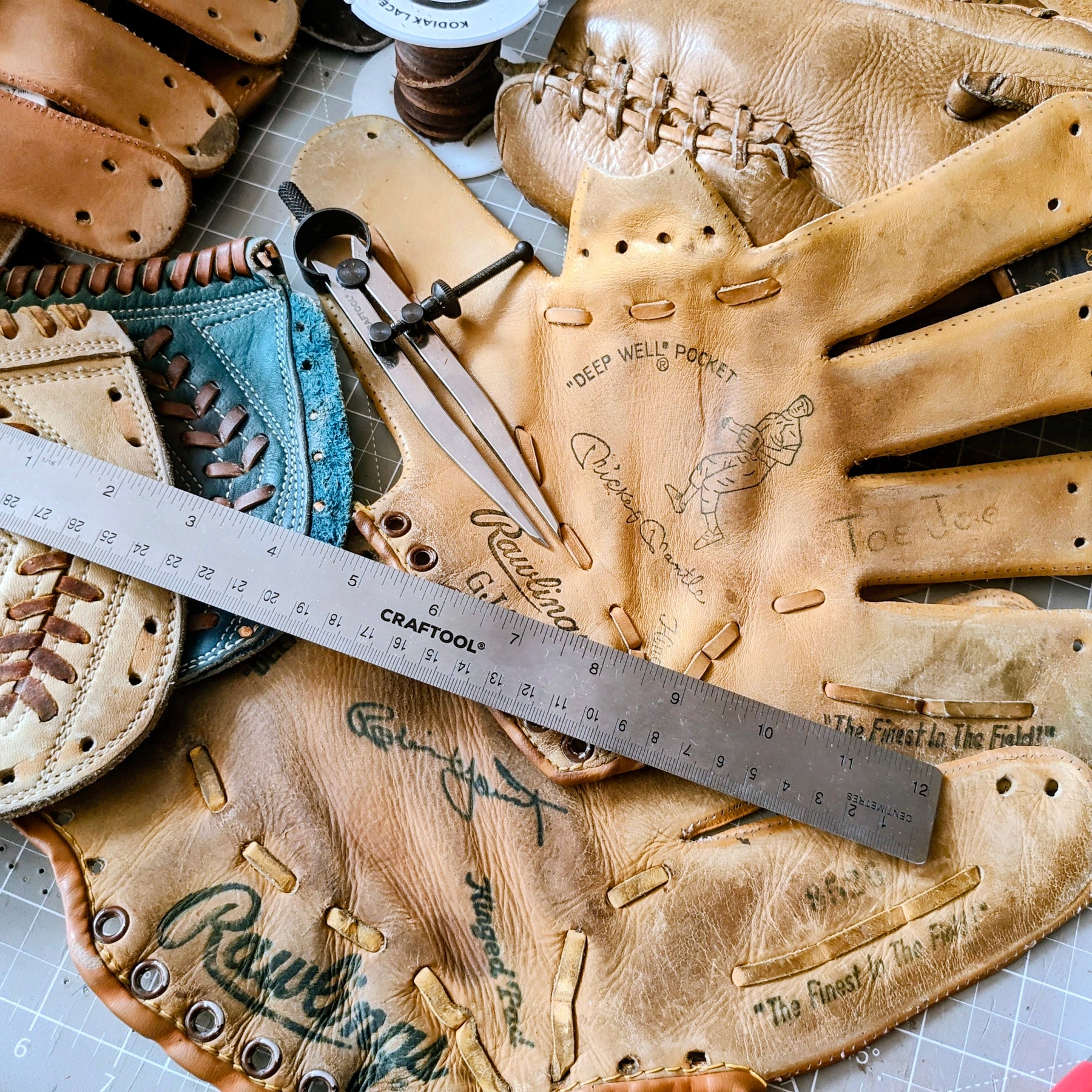 Leather craftsman transforming a baseball glove
