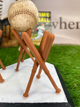 Three Darker Wood colored Ball Display Holders